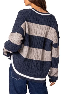 Add a varsity-inspired element to your wardrobe with this boldly striped V-neck sweater cut in an oversized fit with slouchy dropped shoulders. V-neck Long sleeves Dropped shoulders Ribbed cuffs and hem 50% polyester, 50% rayon Machine wash, dry flat Imported Navy Casual Sweater With Contrast Stripes, Fall Striped Cable Knit Sweater, V Neck Cable Knit Sweater, Cable Knit Sweater Womens, Oversized Knitted Sweaters, Cute Sweaters, Cable Knit Sweater, V Neck Sweater, Vneck Sweater