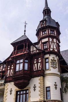 an old building with many windows and a steeple