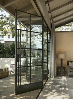 the inside of a house with glass walls