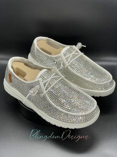 Be the Belle of the Bridal Bling Ball with the perfect accessory for your perfect day!   This is as close to Cinderella's glass slipper as they come! Authentic Hey Dude Shoes, handmade, packed with a variety of European crystal sizes for maximum sparkle!  There is a turnaround time of 3-4 weeks from the order date.   Each top quality crystal is hand placed with detail for your special occasion.    I use the highest quality glass crystals, not plastic or resin. They cost more but worth it since t Rhinestone Hey Dudes, Bedazzled Hey Dudes Wedding, Cinderella's Glass Slipper, Ranch Landscaping, Bling Wedding Shoes, Hey Dude Shoes, Hey Dudes, Zach Bryan, Bling Wedding