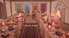 a dining room filled with lots of food and candles