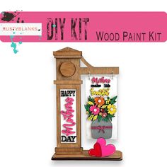 a wooden painting kit with flowers and hearts