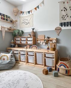 a child's playroom with toys and decor