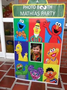 a child's photo booth with the sesame street characters and their names on it