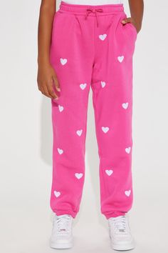 Available In Fuchsia. Joggers Heart Embroidery Fleece Pockets Cuff Hem Pull On Disclaimer: Pattern Placement May Vary. Body: 100% Polyester Rib: 95% Polyester 5% Spandex Imported | Mini Heart Print Fleece Jogger Pant in Fuchsia size Small by Fashion Nova Playful Pink Cotton Pants, Cute Pink Pants With Elastic Waistband, Pink Heart Print Bottoms For Loungewear, Playful Pink Bottoms With Elastic Waistband, Pink Cotton Pants For Playwear, Pink Cotton Playwear Pants, Pink Playwear Bottoms, Pink Bottoms For Playwear, Pink Long Pants For Playwear