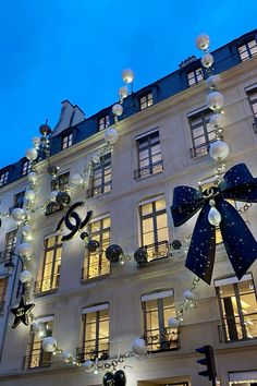 a large building with lights and decorations on it