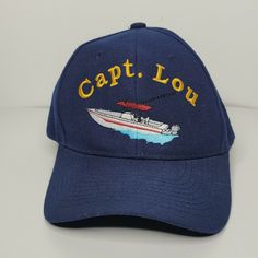 Capt. Lou Navy Blue Hat Cap Boat 100% Acrylic. Condition is "used". Hat is in good shape Let me know if yo have any questions. Thanks for stopping by! Casual Boating Cap, Blue Hats With Embroidered Logo And Curved Brim, Blue Flat Bill Hat With Embroidered Logo, Navy Baseball Cap, Navy Fitted Cap, Blue Fitted Cap, Collegiate Navy Cap, Navy Fan Merchandise Cap, Vintage Blue Adjustable Fitted Hat