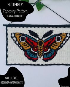 a butterfly tapestry hanging on a wall with the words, butterfly tapestry pattern - laka crochet