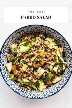 a blue and white bowl filled with faro salad next to a text overlay that reads the best faro salad