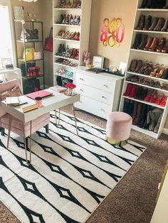 a living room filled with lots of furniture and shoes on top of a white rug