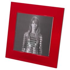 a red frame with a photo of a woman