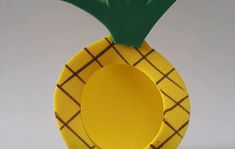 a paper plate with a pineapple on it