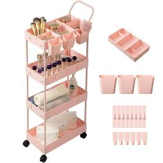 a pink cart with makeup brushes, cups and other items on it's sides