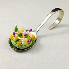 a spoon that has some flowers on it