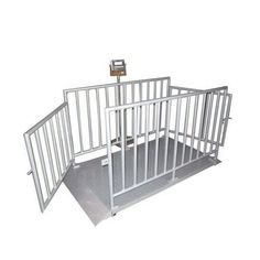 the gate is open and ready to be used as a baby crib or playpen