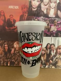 a plastic cup with the words meanoskin on it and an image of a woman's mouth