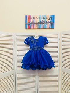 Royal Blue pageant beauty cocktail dress with rhinestones/ Toddler pageant dress/ Knee length dress/ Custom pageant dresses This beautiful dress is made from high quality organza. It is decorated with blue rhinestones and appliqué. The dress has natural lining and zipper back. It is easy to care and comfortable to wear. The dress comes in knee length. It has tulle petticoat. The dress is perfect for all pageant events and as cocktail and beauty dress. It is absolutely stunning on! Materials Orga Royal Ball Gown Quinceanera Dress, Royal Quinceanera Ball Gown Dresses, Royal Fitted Ball Gown For Quinceanera, Princess Style Fitted Dress For Quinceanera, Blue Princess Style Evening Dress For Parties, Royal Fitted Dress For Quinceanera, Blue Fitted Organza Ball Gown, Fitted Blue Organza Ball Gown, Elegant Ruffled Pageant Dress For Prom Season