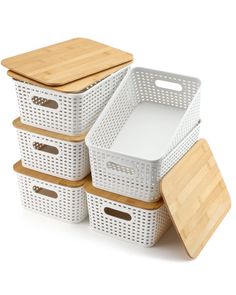 white storage baskets with bamboo lids and cutting boards