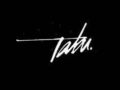 the word tati written in white ink on a black background with an arrow pointing to it