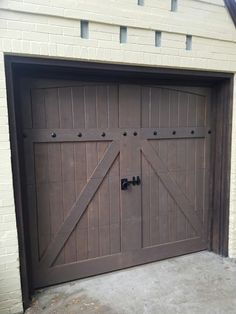 an image of a garage door that is painted brown