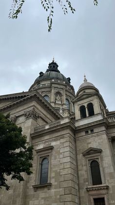 an old building with a clock tower on top