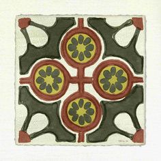 an artistic tile design in red, yellow and green with four circles on the center