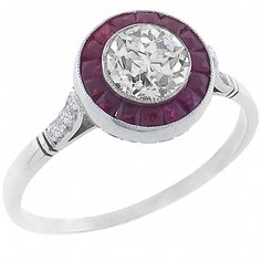 This is a remarkable diamond ruby platinum engagement ring from the Art Deco era. The ring is centered with a sparkling EGL certified old European cut diamond that weighs 0.72ct. The color of the diamond is H-I with SI1 clarity. The center diamond is accentuated by deep red step cut square rubies that weigh approximately 0.30ct. Vintage Antique Engagement Rings, Art Deco Engagement Rings, Stella Maris, Antique Engagement Rings Vintage, Sweet Jewelry, Platinum Engagement Ring, Step Cut, Ruby Engagement Ring