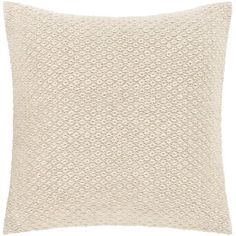 a cream colored pillow on a white background