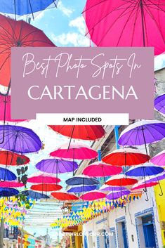 colorful umbrellas are hanging from the ceiling in an alleyway with text overlay that reads best place spots in cartagena