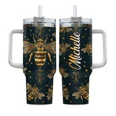 two black and gold travel mugs with bees on them, one has the words awesome written