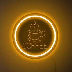 a neon sign with a coffee cup on it's side and the word coffee written below