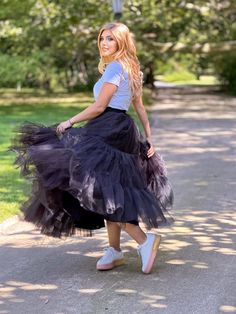 This Black dance skirt is an absolute must-have for any fashion-forward woman! The vibrant colors and comfortable fit make it ideal for any occasion. Whether you're hitting the road or enjoying a picnic in the park, this skirt is sure to turn heads. Black Ruffled Tulle Skirt crafted from 100% cotton base fabric and adorned with two layers of black tulle ruffles. The waistband features a soft and comfortable elastic, making it suitable for extended wear. Elevate your wardrobe with this unique tulle skirt, adding a touch of style and grace to your look. Perfect for special occasions and everyday wear. **The model in the picture is 170 cm tall and is wearing a skirt in size S US, with a length of 95 cm. The skirt is easy to care for, as it can be machine washed and ironed to your liking, ensu Black Tulle Bottoms For Night Out, Black Tulle Skirt For Fall, Black Tiered Tulle Skirt, Chic Black Tulle Maxi Skirt, Chic Black Maxi Skirt With Tulle, Casual Black Voluminous Skirt, Black Maxi Skirt For Party, Black Voluminous Skirt For Fall, Chic Black Bottoms With Tulle Skirt