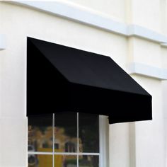 a black awning on the side of a building