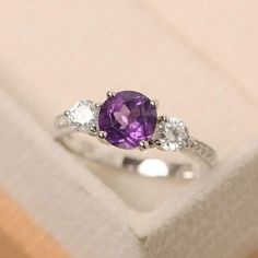 Amethyst ring round cut February birthstone ring sterling | Etsy Luo Jewelry, February Birthstone Ring, Purple Stone Rings, Silver Engagement Ring, 3 Stone Engagement Rings, Engagement Ring For Women, Round Cut Engagement Rings, Purple Band, Gem Ring