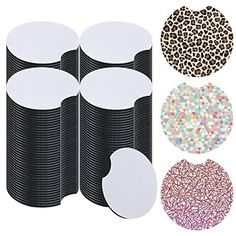 four different types of round paper discs and one is black with white dots on it