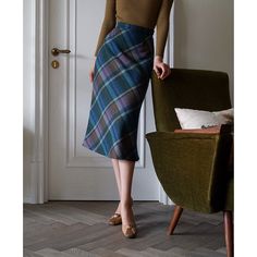 A plaid skirt that creates the atmosphere of an elegant British lady. Gives your legs a long, clean look. Designed for ease of use and matching in everyday life. Retro items reminiscent of the good old days. 
 
 Color 
 
 Red 
 Brown 
 Blue 
 
 
 Size 
 
 XS size 
 
 Length: 75cm 
 Waist: 62cm 
 Hip: 90cm 
 
 S size 
 
 Length: 79cm 
 Waist: 66cm 
 Hip: 94cm 
 
 M size 
 
 Length: 79cm 
 Waist: 70cm 
 Hip: 98cm 
 
 L size 
 
 Length: 79cm 
 Waist: 74cm 
 Hip: 102cm 
 
 
 
 
 Material 
 
 Wool Elegant Plaid Skirt, Chic Knee-length Plaid Bottoms, Chic Plaid Midi Skirt, Elegant Plaid Knee-length Skirt, Elegant Knee-length Plaid Skirt, Chic Long Plaid Skirt, Plaid Pencil Skirt Outfit, Romantic Feminine Style, Pencil Skirt Outfits