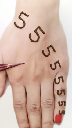 a woman's hand with the word success written on it