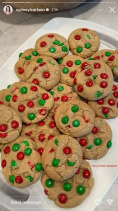 there is a platter full of cookies with m & m candies on them