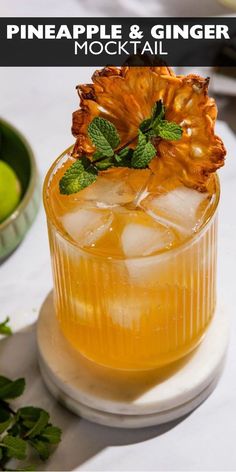 pineapple and ginger mocko cocktail in a glass with mint garnish on the rim