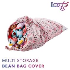 a bag filled with stuffed animals sitting on top of a white background and the words multi storage bean bag cover