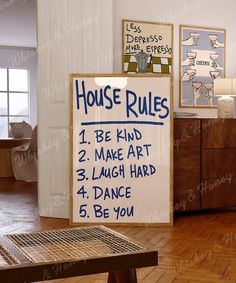 a house rules sign in front of a wooden table