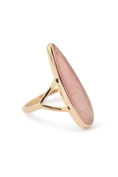 a gold ring with a pink stone in it