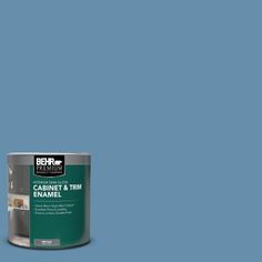 the behr paint is light beige and it has a white base with black lettering