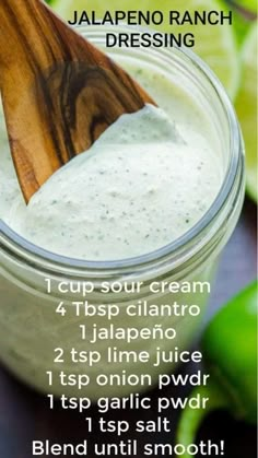 the recipe for jalapeno ranch dressing in a jar with a wooden spoon