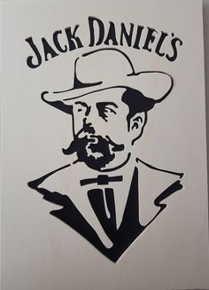 a wooden sign that says jack daniels with a man's face in the center