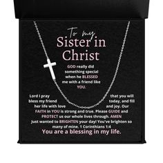 a necklace with a cross on it that says to my sister in christ