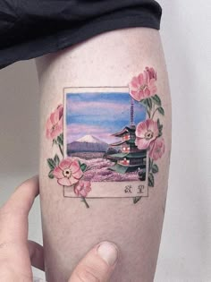 a person with a tattoo on their leg