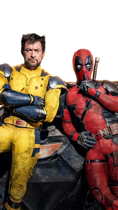 two deadpools are sitting next to each other in front of a motorcycle and one is wearing a yellow suit