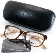 WELCOME TO OUR OPTICAL STORE !!!  NEW COACH HC 6072 5328 Brown Glitter /Crystal Light Brown EYEGLASSES 50-17-135mm. (Box7-10) Model: HC6072 Color: Brown Glitter /Crystal Light Brown Size: 50-17-135mm Vertical of the lens approx.: 36mm  Overall frame width approx.: 127mm Lenses: Clear demo lenses (demo lenses are ready to be fitted with your prescription) Includes: COACH hard case and cleaning cloth. Actual photos of these glasses. This is exactly what you will receive. Notes: no scratches /there are reflections from photo lamps Coach Eyewear Sophisticated eyeglasses and sunglasses styles from Coach complete your eyewear look with a heavy measure of modern chic. Timeless silhouettes that made Coach a luxury favorite mingle with updated styles to suit a fashionista's diverse wardrobe.    Sty Coach Cateye Glasses, Timeless Silhouettes, Coach Eyeglasses, Coach Glasses, Coach Brown Wallets For On-the-go, Brown Glitter, Brown Eyeglasses, Photo Lamp, Optical Store