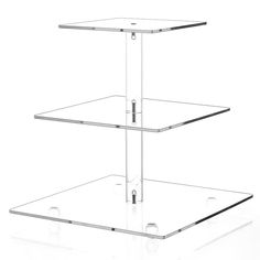 three tiered glass shelf on white background